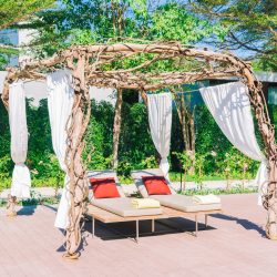 Umbrella pool and chair in beautiful luxury hotel pool resort - Filter Processing style pictures